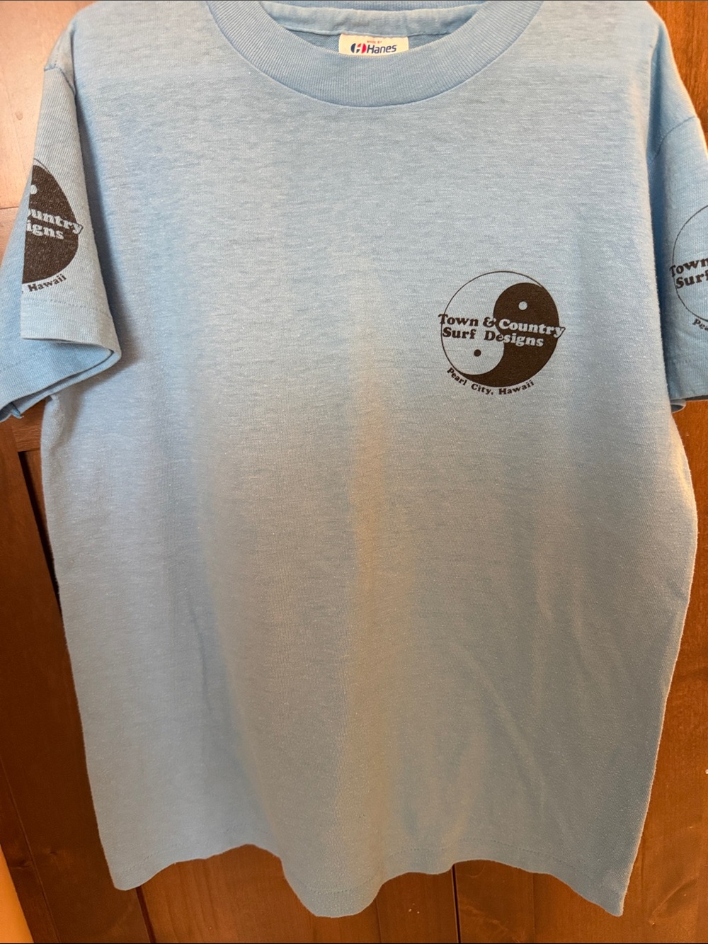 1980’s Vintage T&C boys Light Blue T-Shirt with Black Surf Logo.